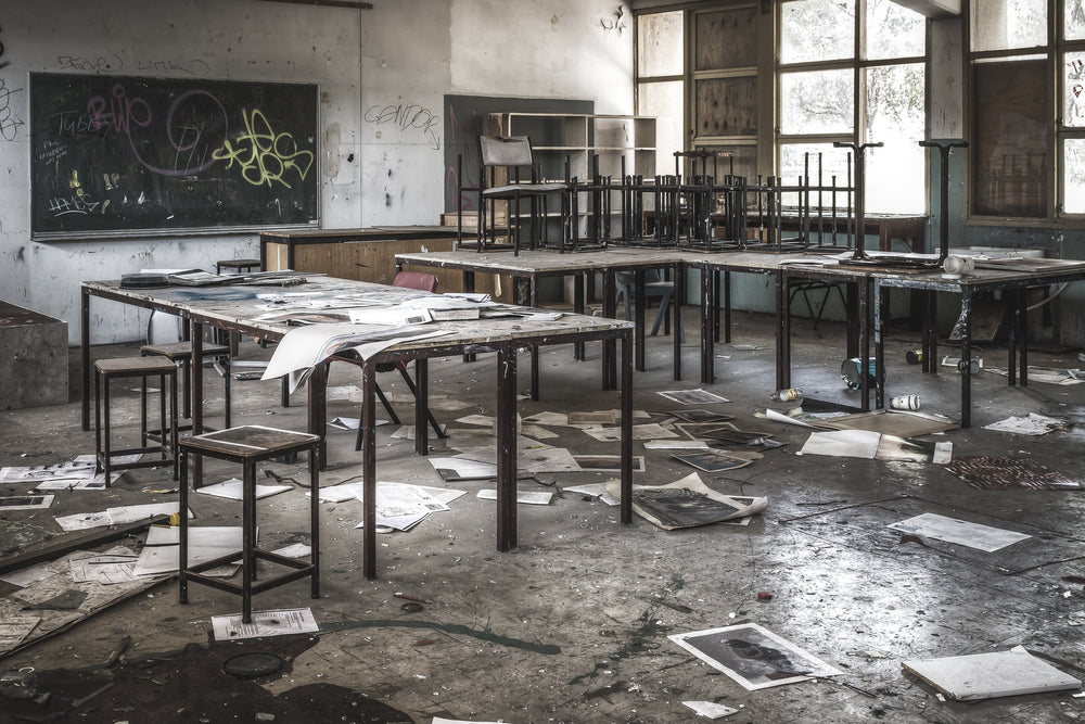Art Class at Macquarie Boys Technology High, wooden stools sit upright around long laboratory-style benches.