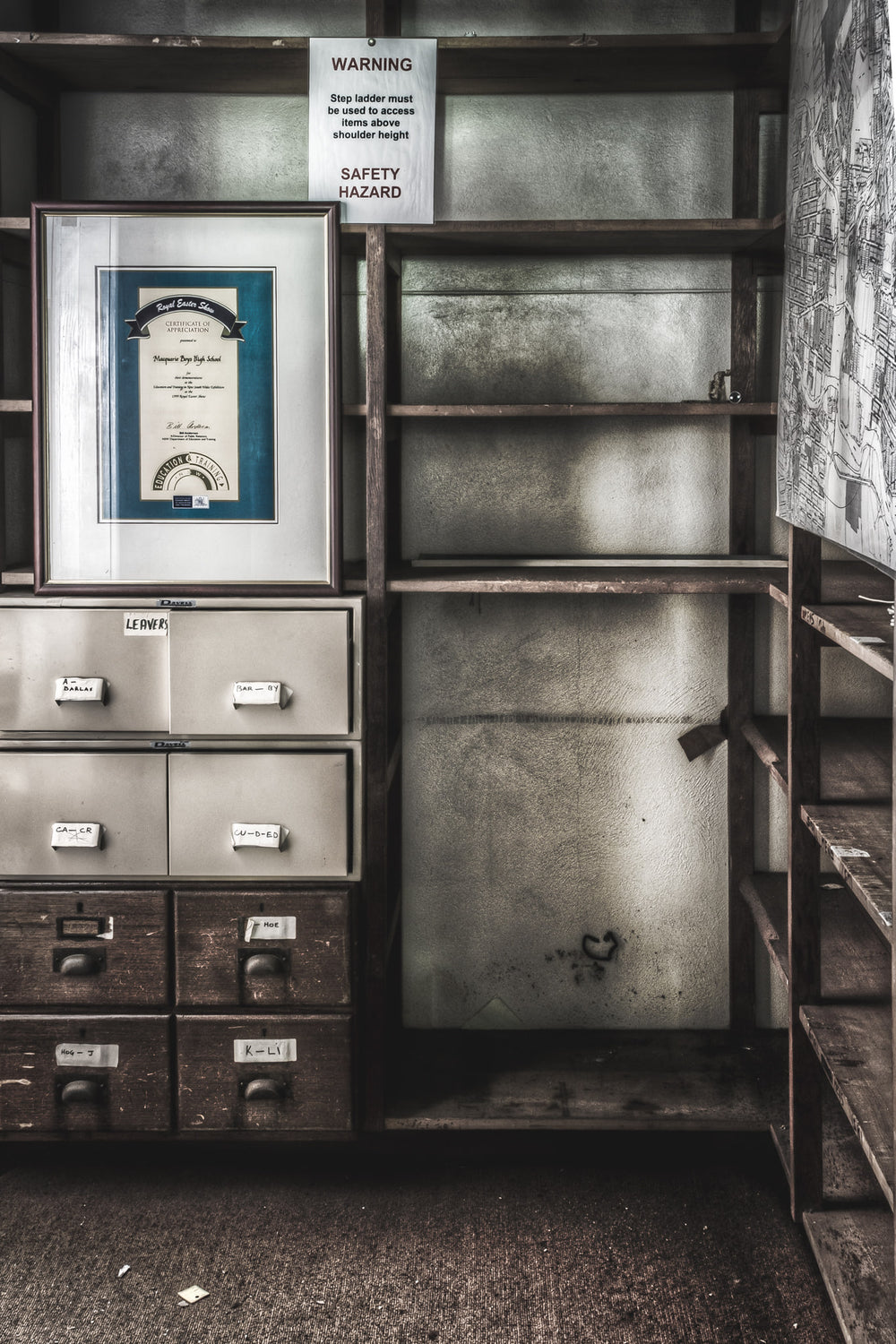 Student Records at Macquarie Boys Technology High, a filing cabinet sits against timber shelving inside the records office at Macquarie Boys Technology High.