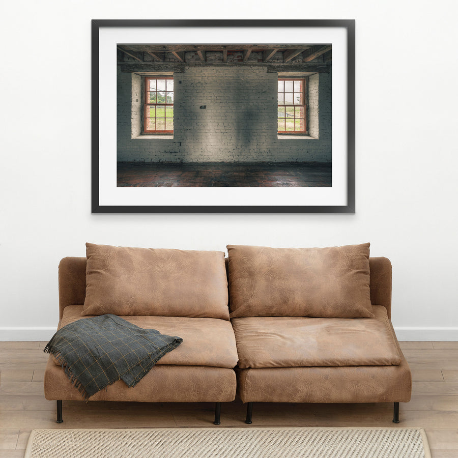 Twin timber sash windows at Jembaicumbene, whitewashed brick wall with exposed red brick reveals.