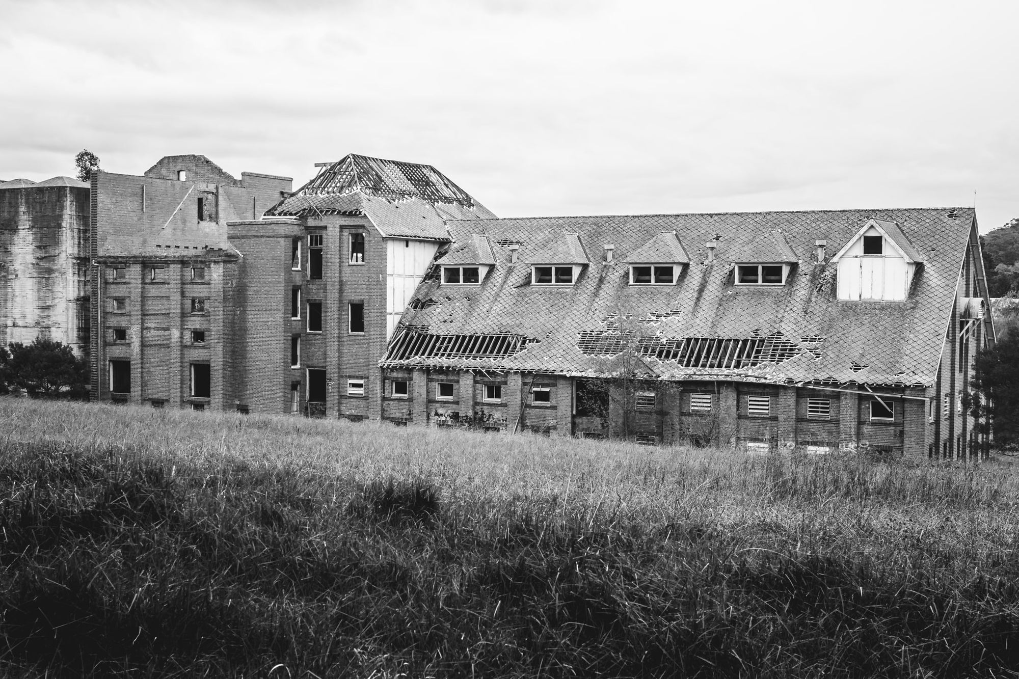 Malthouse Three at Mittagong Maltings, shot across a grassy field viewing what remains of the maltings.