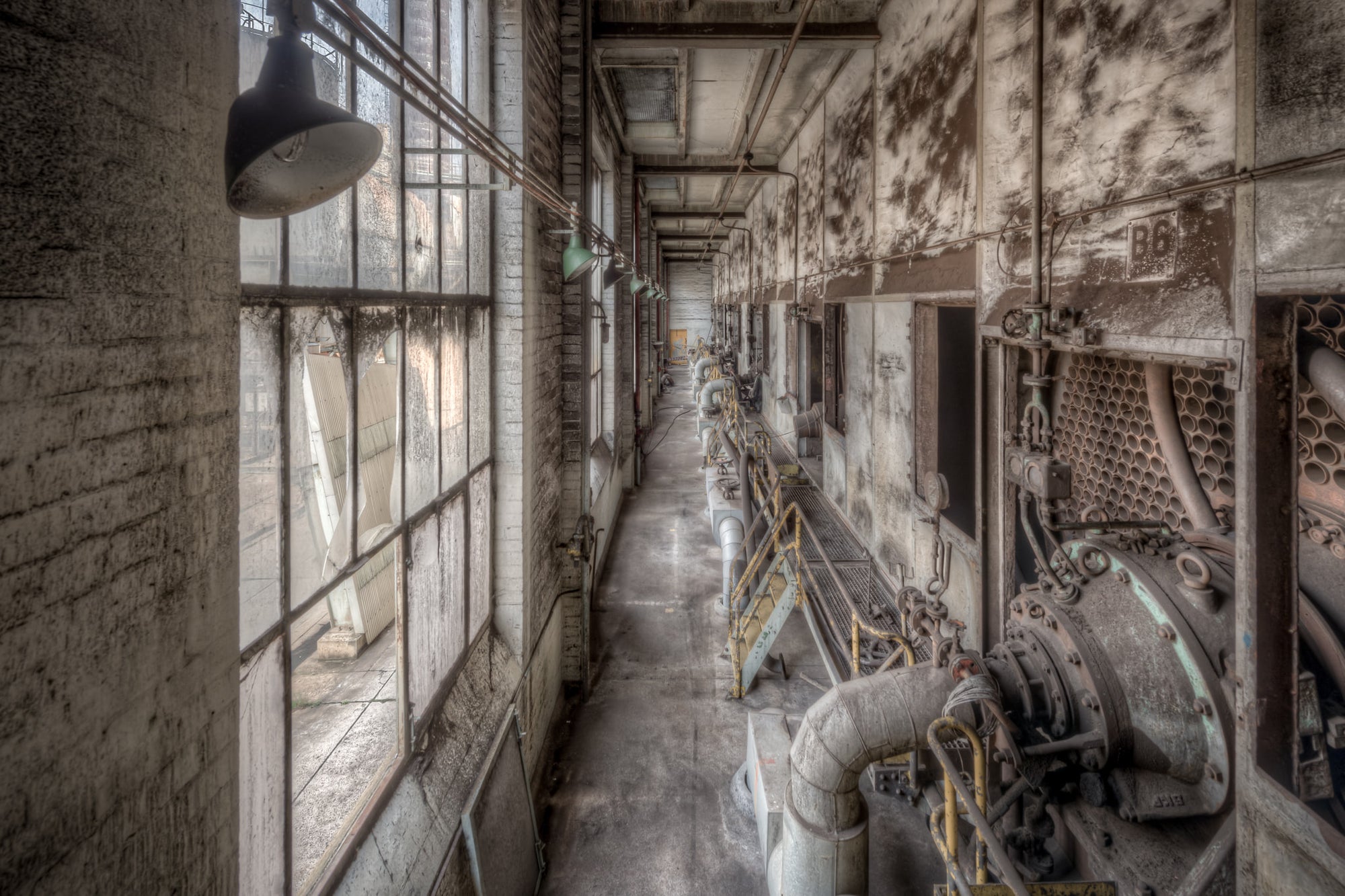 B Factory Dryers at Morwell Power Station, a narrow service corridor runs the length of B Factory's drying hall.