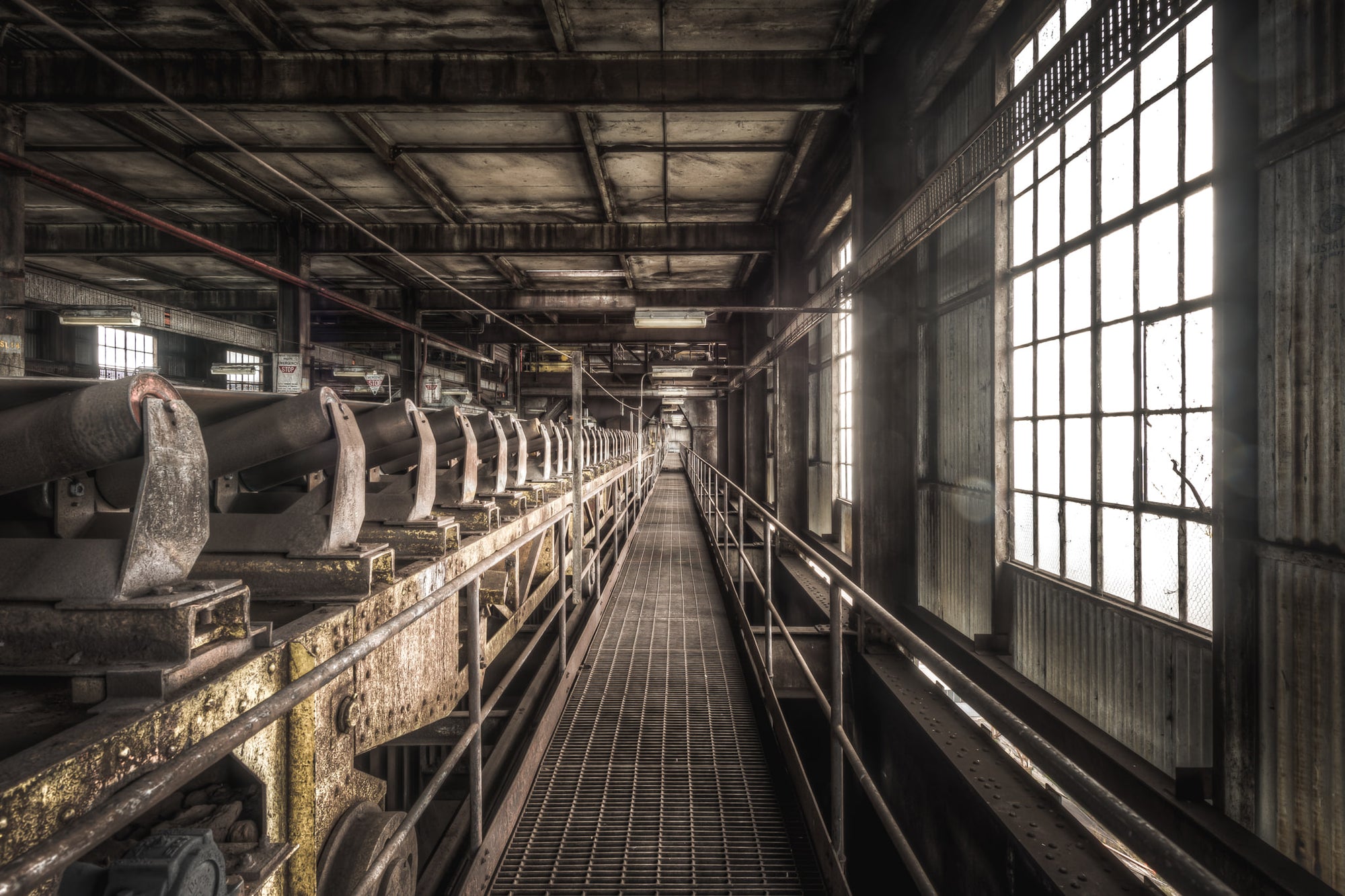 Bunker Conveyor at Morwell Power Station, a steel-grate maintenance walkway runs the full length of the conveyor gallery.
