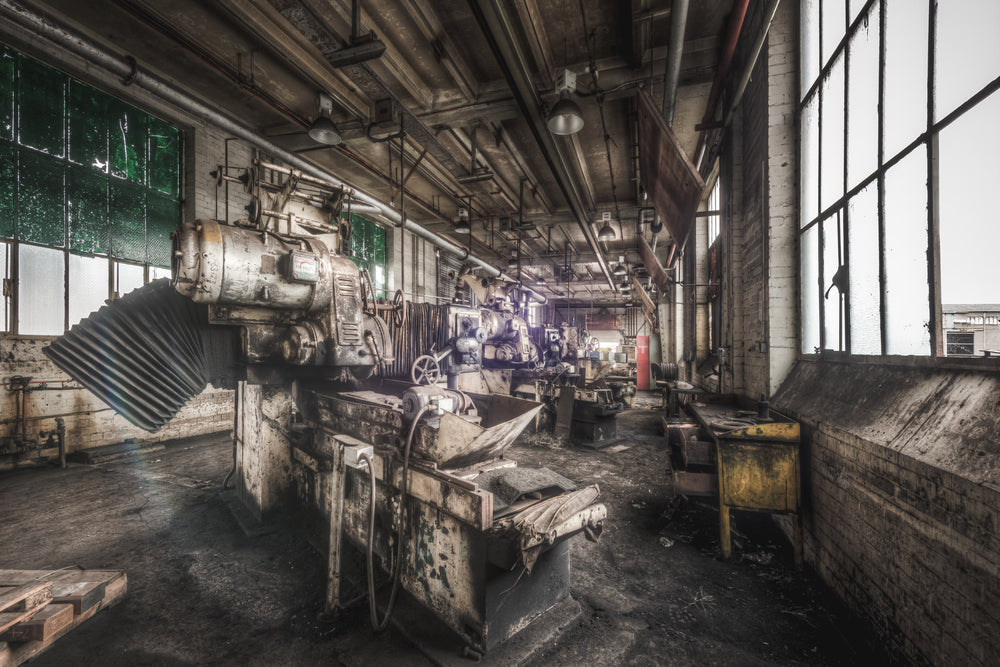 Grinding Shop at Morwell Power Station, heavy milling machines line the workshop floor, their cast-iron beds thick.
