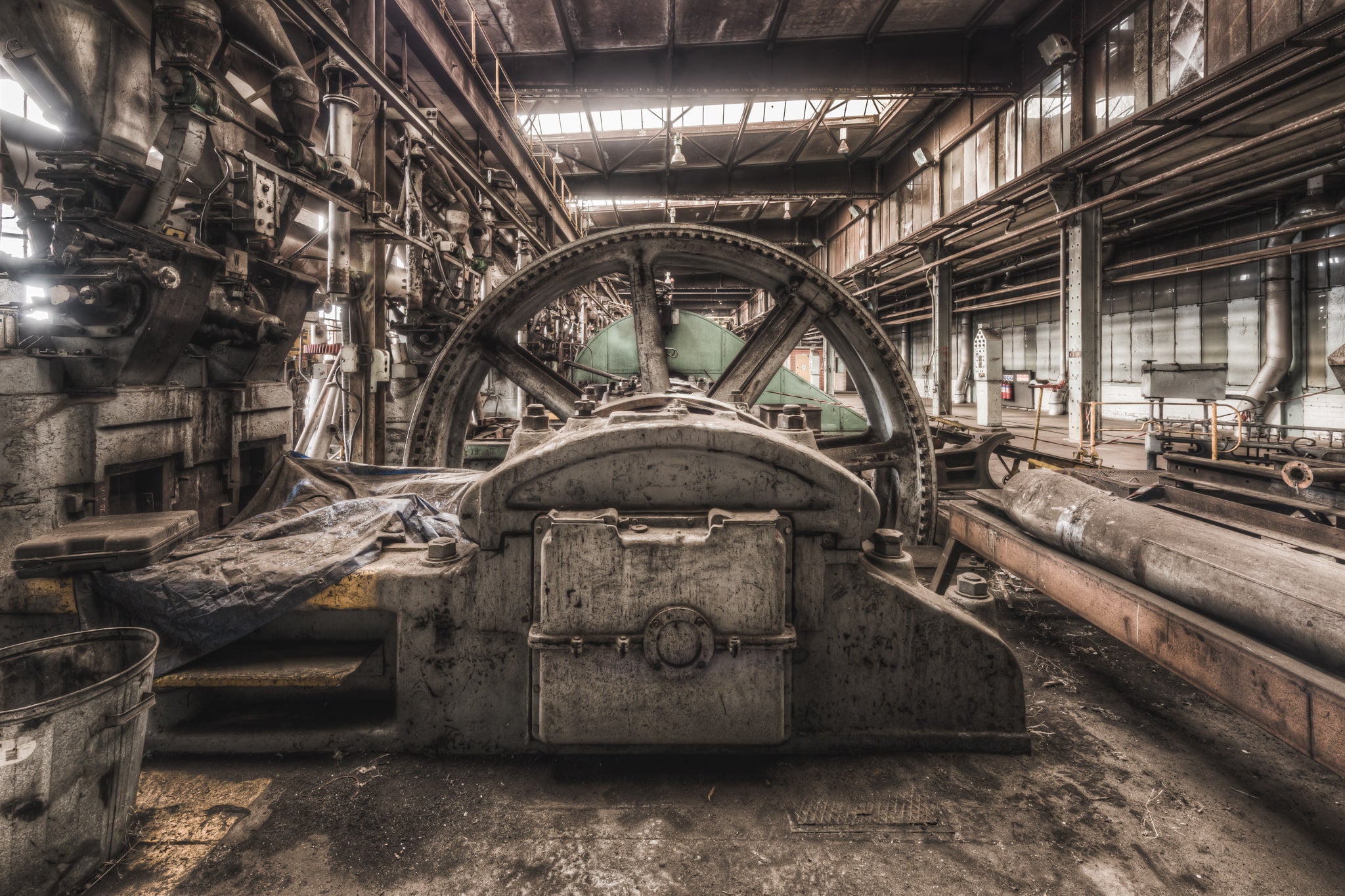 Press Floor at Morwell Power Station, a heavy flywheel sits at the centre of the frame, bolted to a large reciprocating.