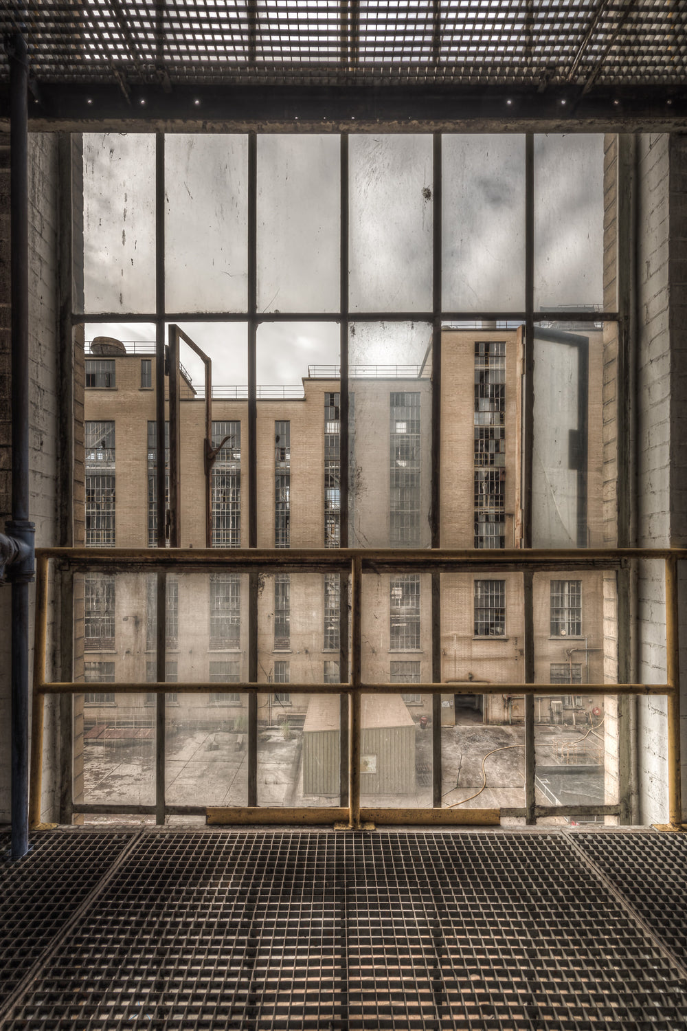 Through the Window at Morwell Power Station, through the boiler house window, another wing of the station.
