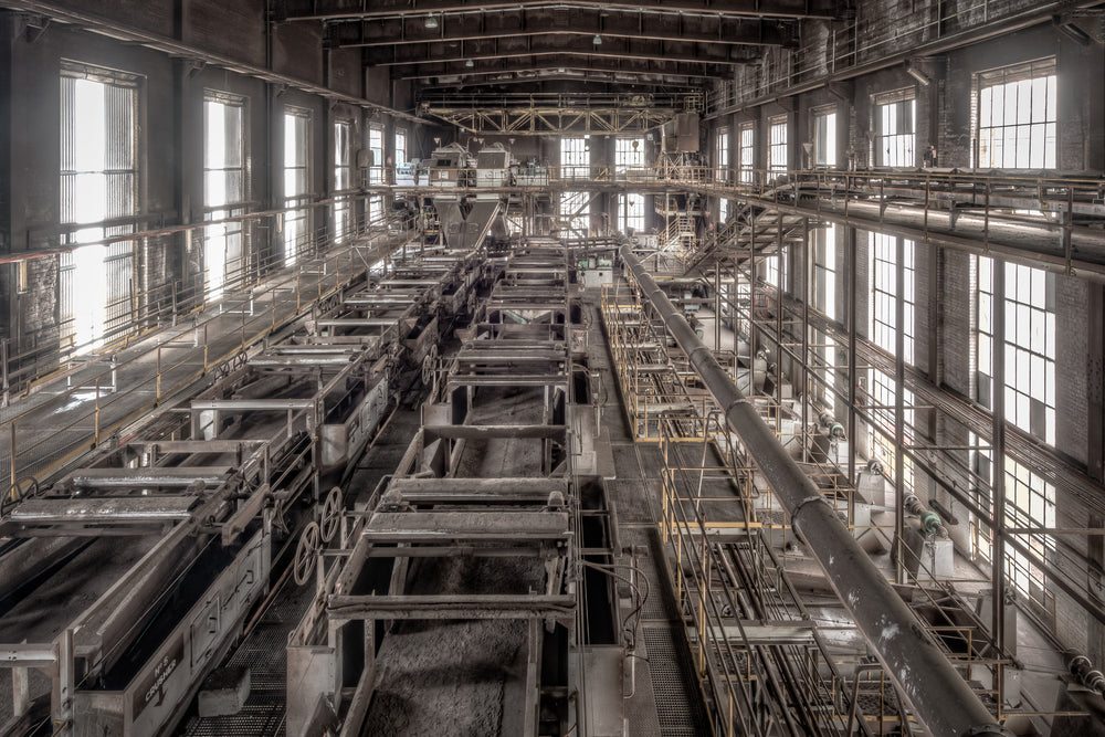 Wet Section at Morwell Power Station, rows of steel filtration trays stretch the full length of the hall, coated in fine.