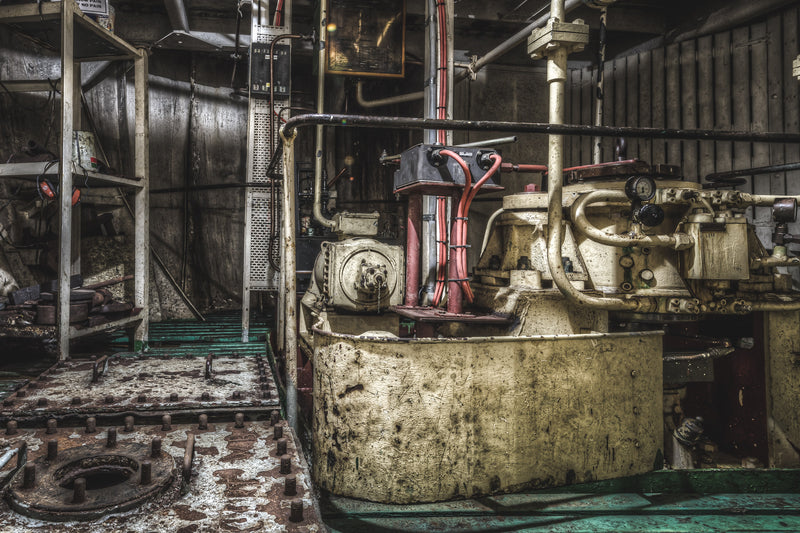 Steering Gear at MV Cape Don, heavy steel machinery fills a tight compartment below deck.