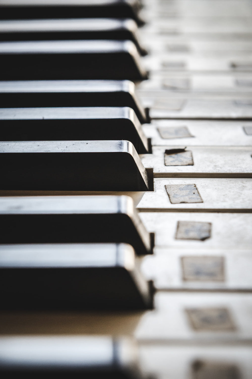 Piano Keys at Nichitsu Mining Village, the white keys are grey with grime.