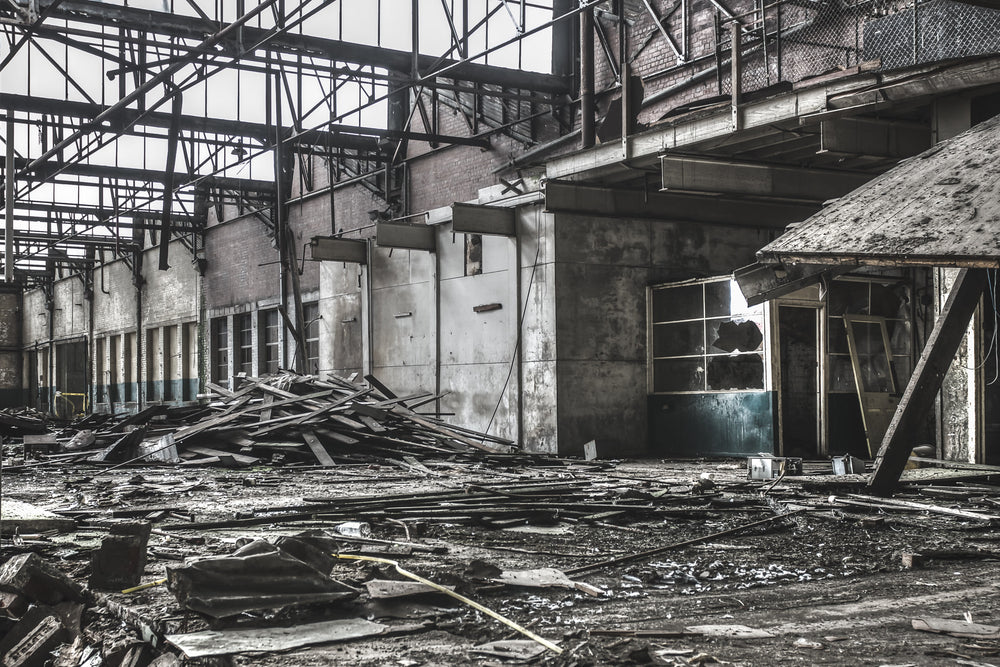 Loading Area at O-I Glass, steel roof trusses span the full width of the loading bay, their framework exposed.