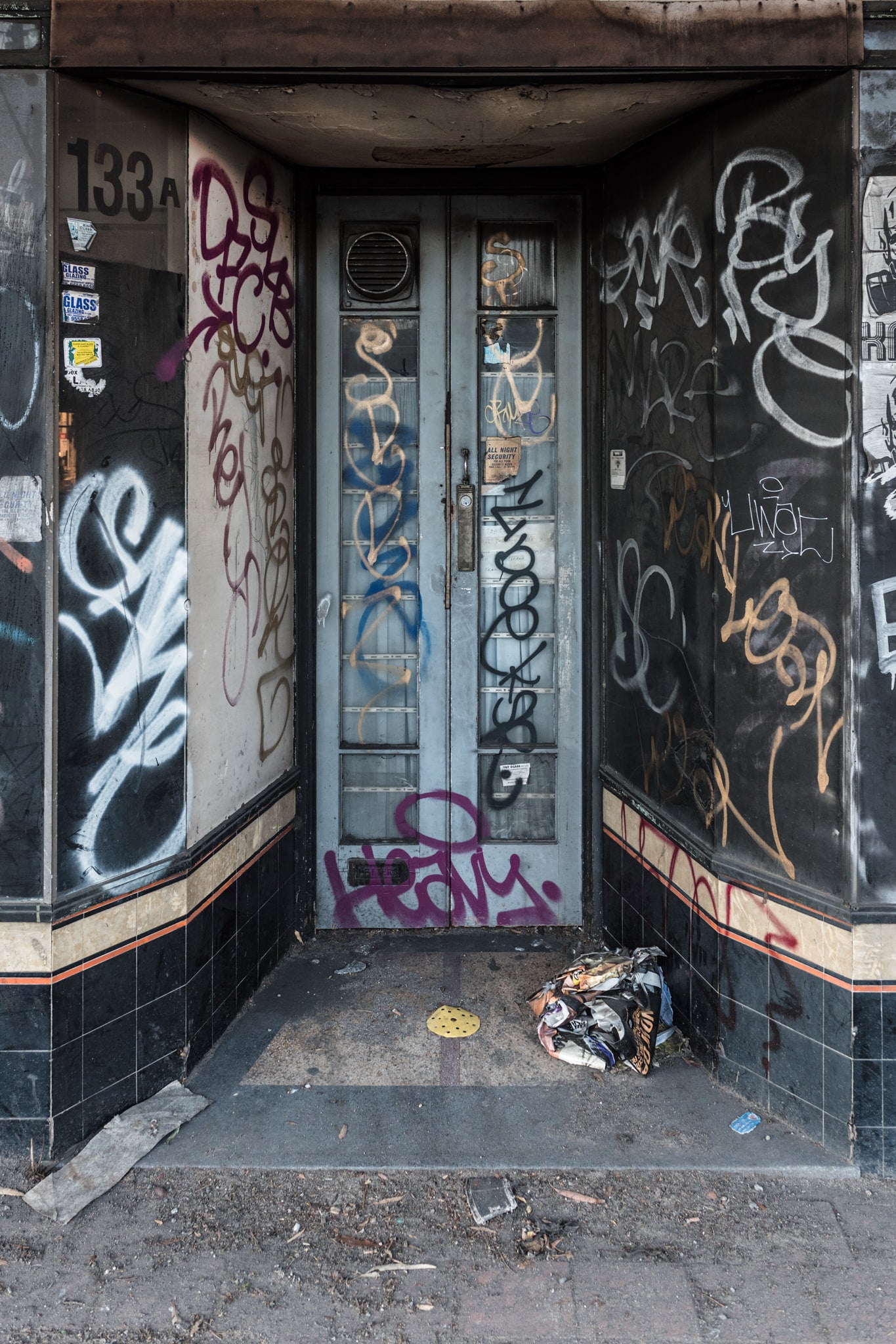 133 at Parramatta Road, a recessed doorway at 133A Parramatta Road.