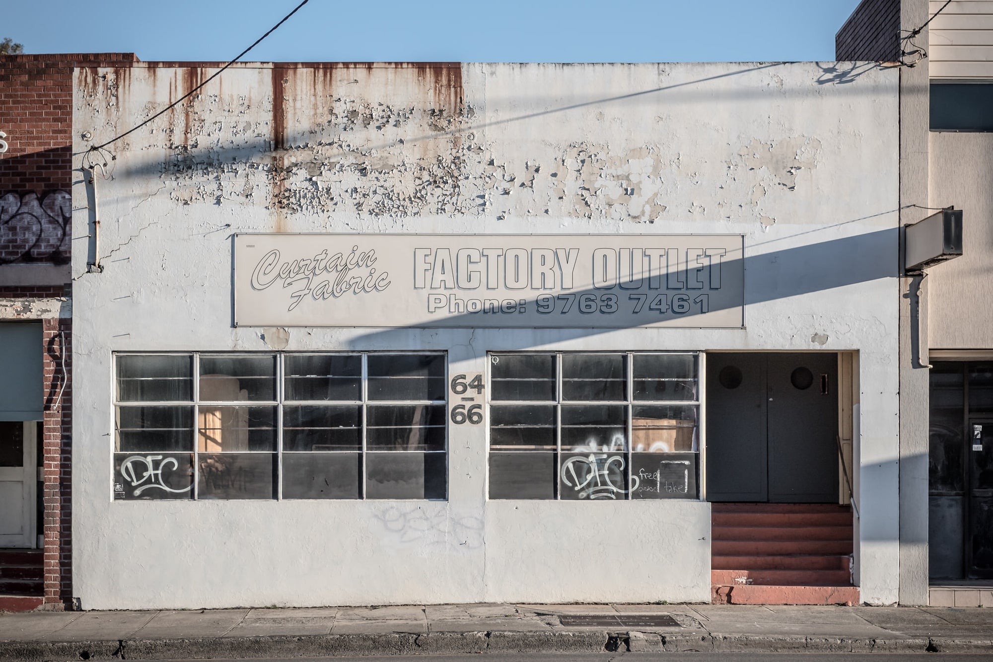 Curtain Fabric Factory Outlet at Parramatta Road, the phone number is still on the sign.