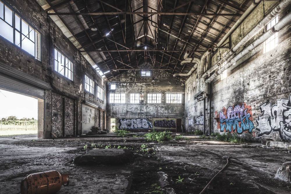 Boiler House at Peters Ice Cream Factory, the towering boiler house interior at Peters' Ice Cream Factory reveals immense, silent machinery.
