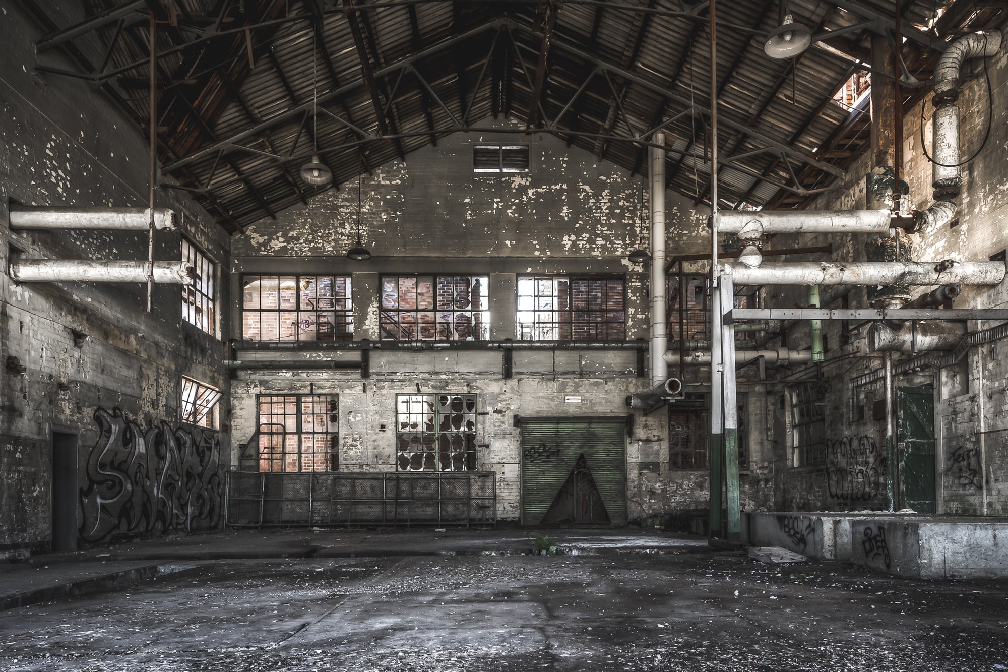 Engine Room at Peters Ice Cream Factory, heavy industrial machinery, once powering a national brand, now sits dormant.
