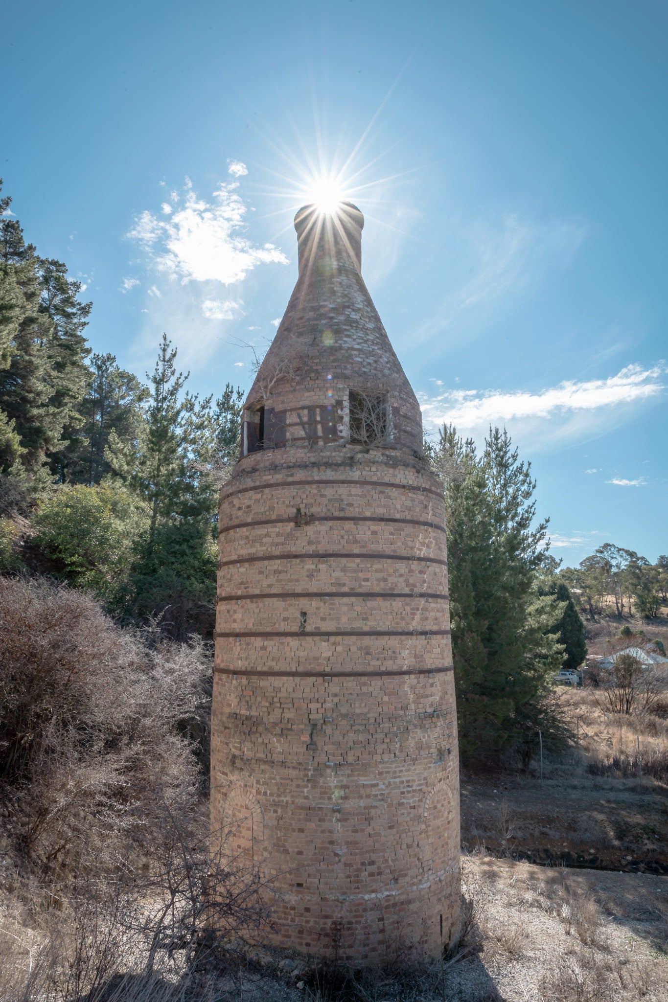 Bottle Kiln at Portland Cement Works, the cylindrical body is built from pale fired brick, banded at intervals by darker.