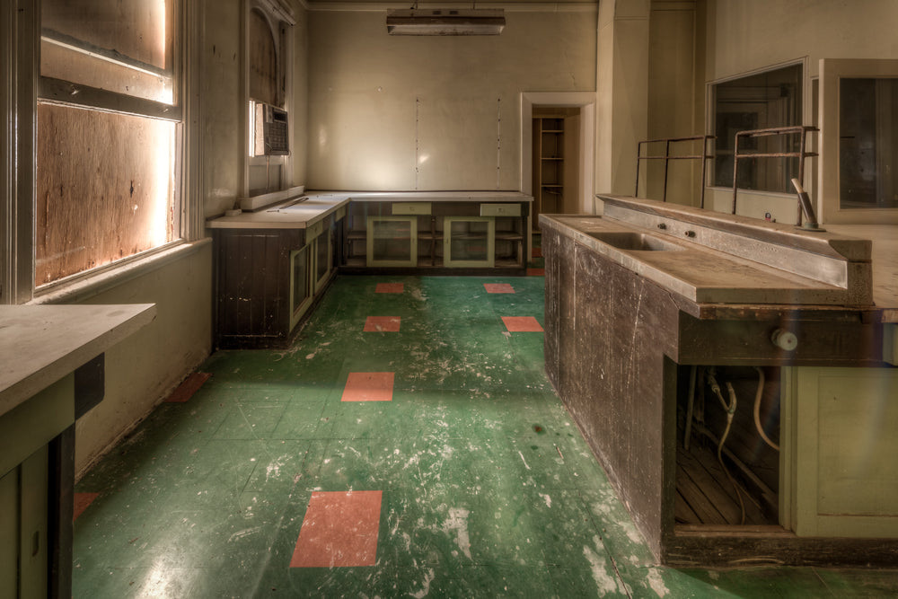 Laboratory at Portland Cement Works, green linoleum covers the laboratory floor, scuffed white in heavy traffic paths.