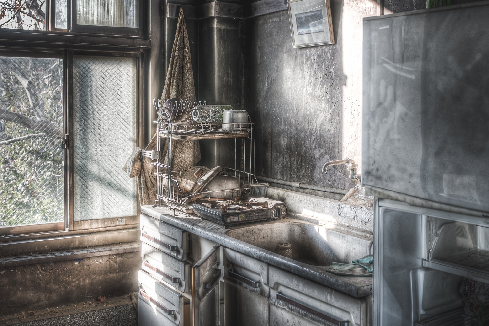 Another Kitchen at Seika Dormitory, you can see the smoke residue covering the walls and the fridge in this shot.