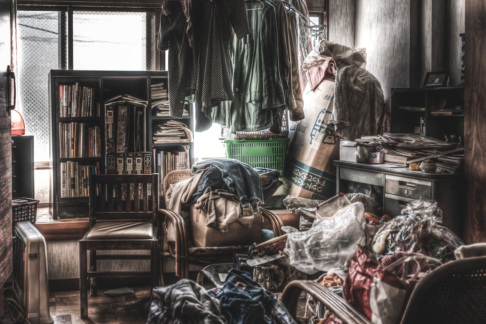 Living Room at Seika Dormitory, clothes are still hanging out to dry several years after the occupant left.