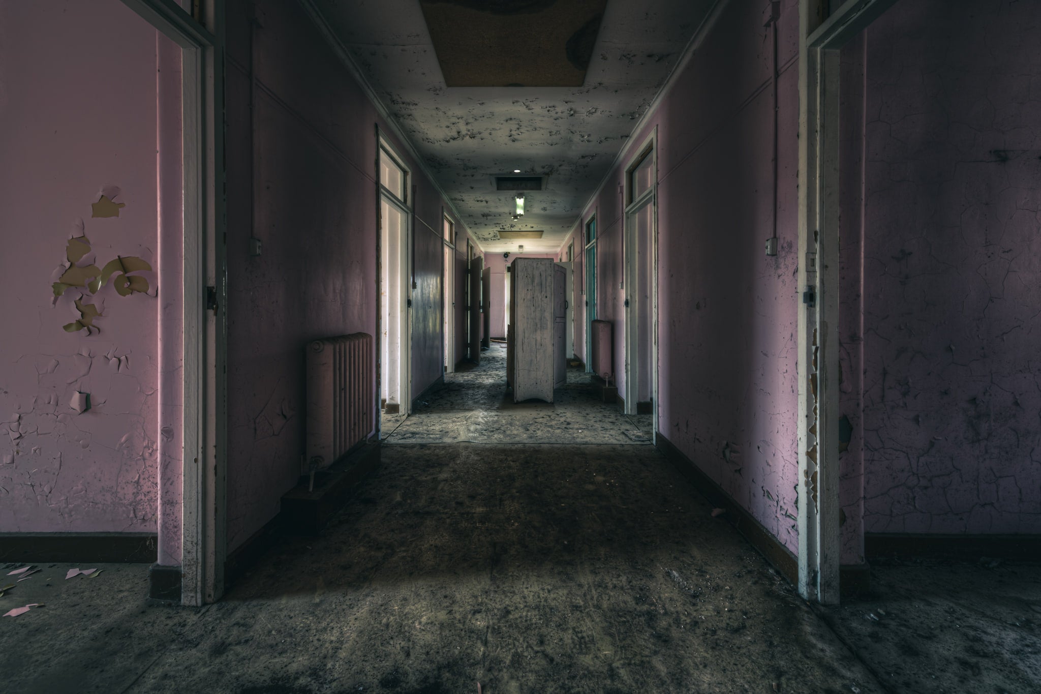 Pretty in Pink at The Asylum, a long corridor stretches deep into the building.