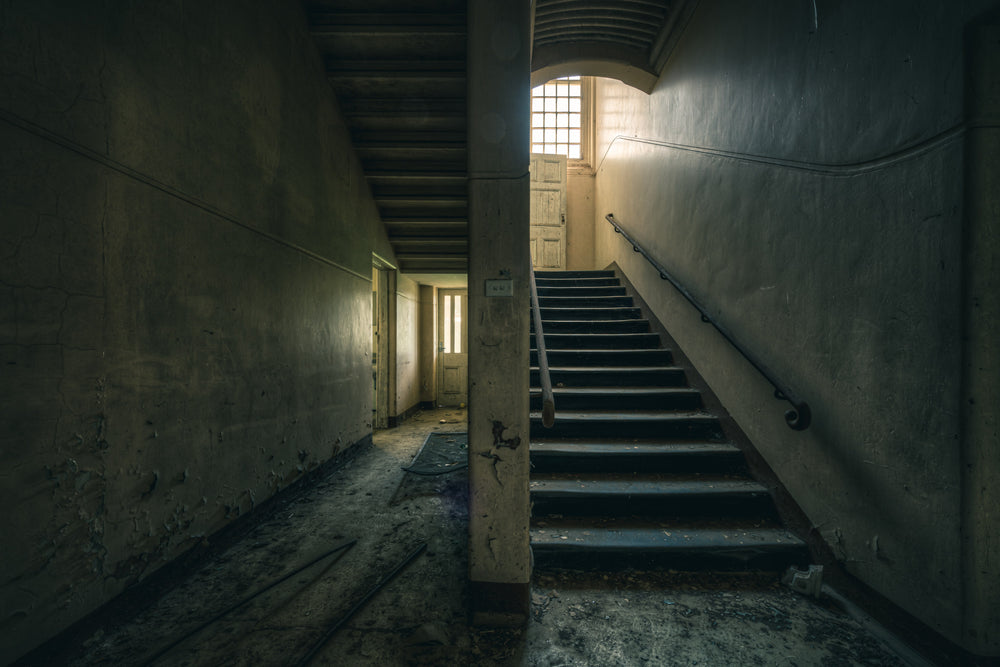 Split at The Asylum, a concrete column divides the ground floor into two paths.