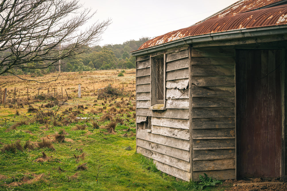 Kiosk at The Post Office, weatherboard cladding, silver-grey and split along the grain.