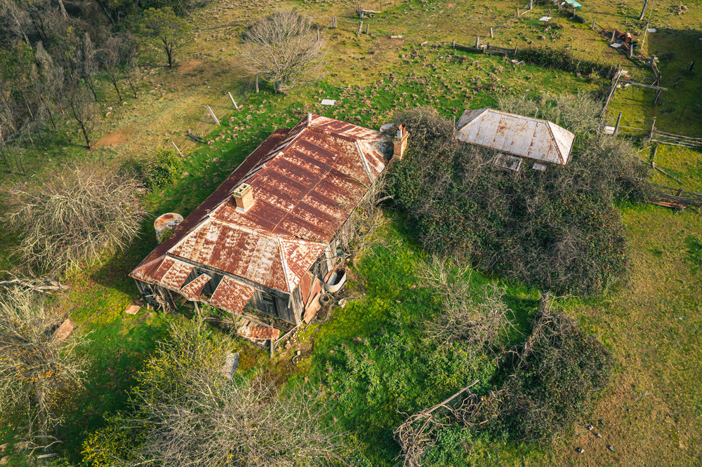 Residence and Surrounds at The Post Office, seen from above, the old residence has almost entirely surrendered.