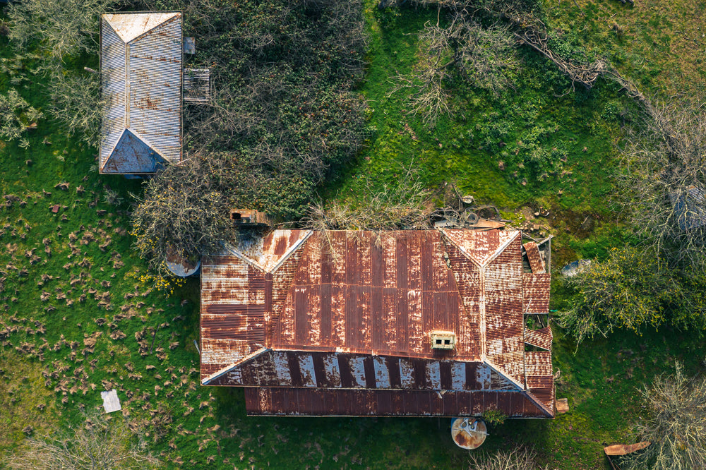 Topdown at The Post Office, from directly above, the corrugated iron roof of the main building stretches wide.