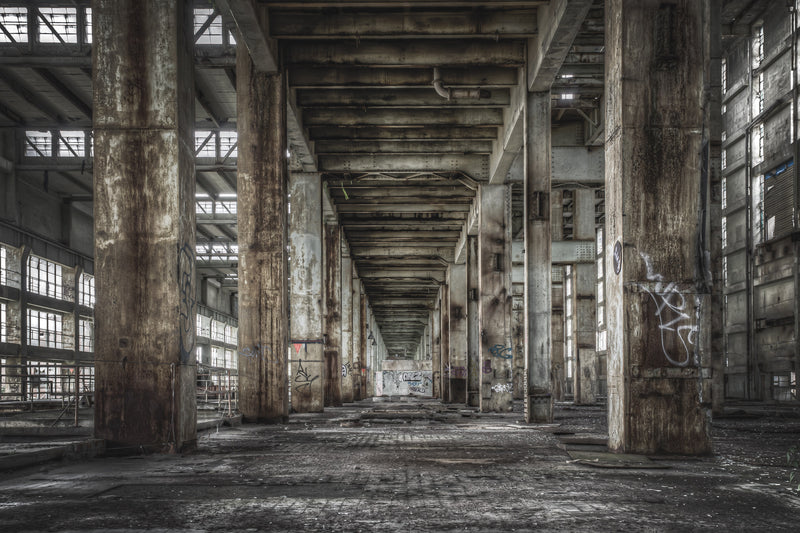 B Station Between Turbine Hall And Boiler House at Wangi Power Station, concrete columns run in two rows down a central.