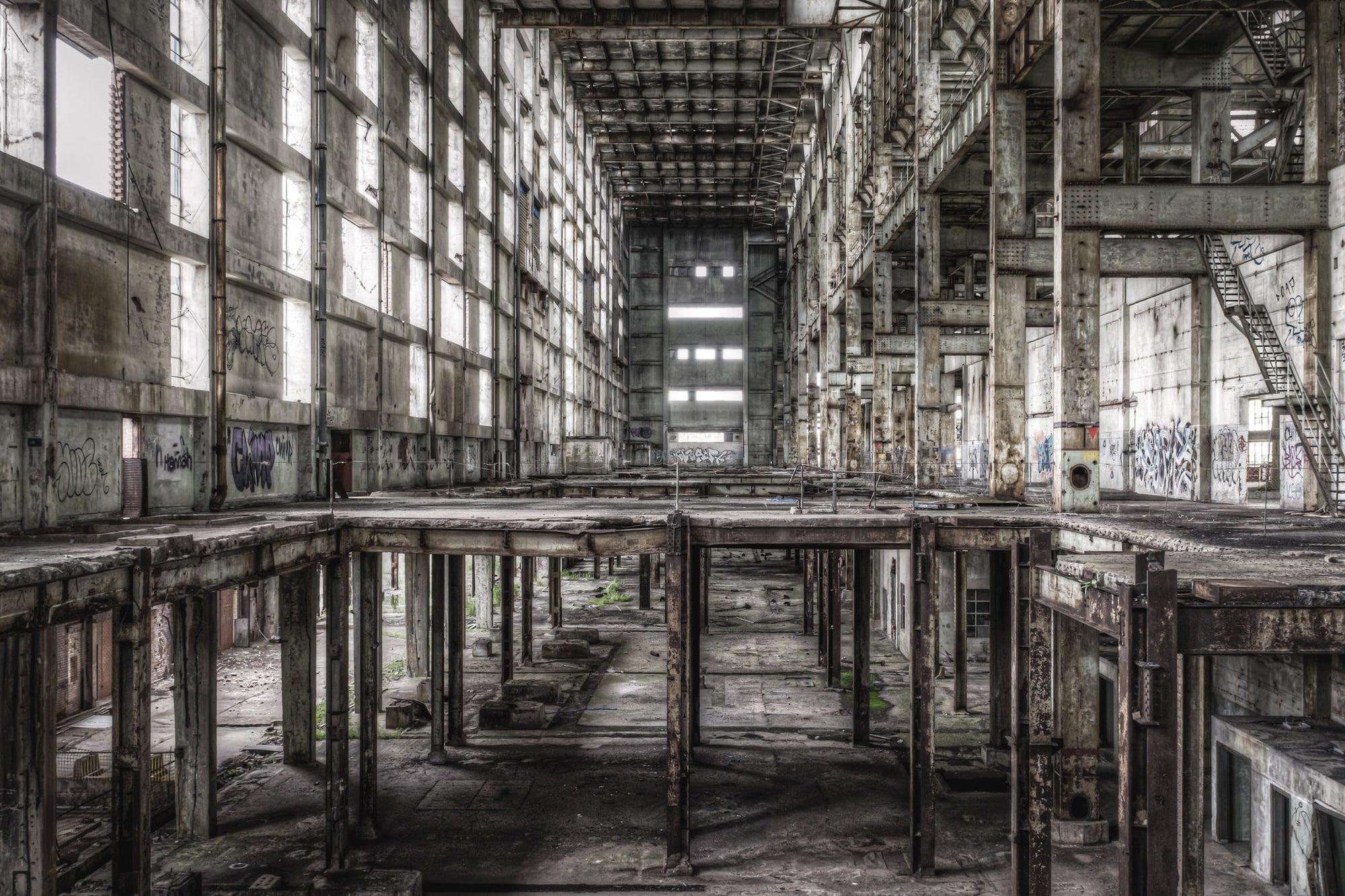Boiler House Looking From A Station To B at Wangi Power Station, a vast, hollow shell of the boiler house stretches.