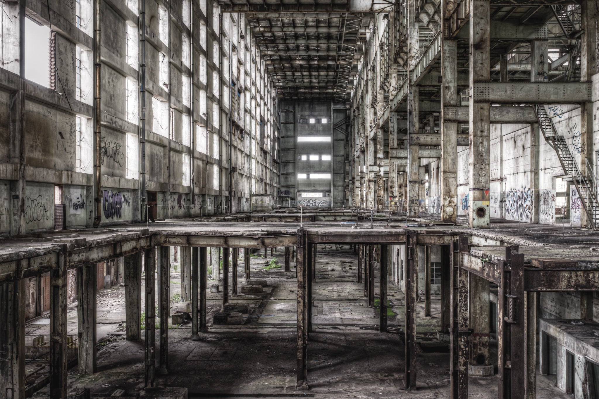 Boiler House Looking From A Station To B at Wangi Power Station, a vast, hollow shell of the boiler house stretches.