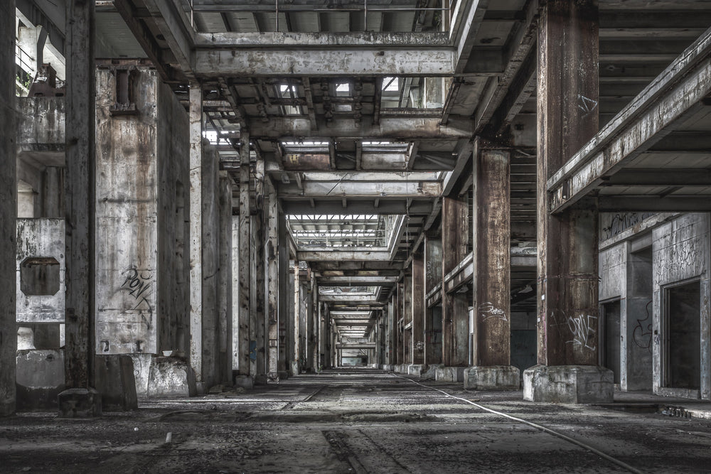 Turbine Hall Basement Looking From A To B Station at Wangi Power Station, reinforced concrete columns run in two rows down.