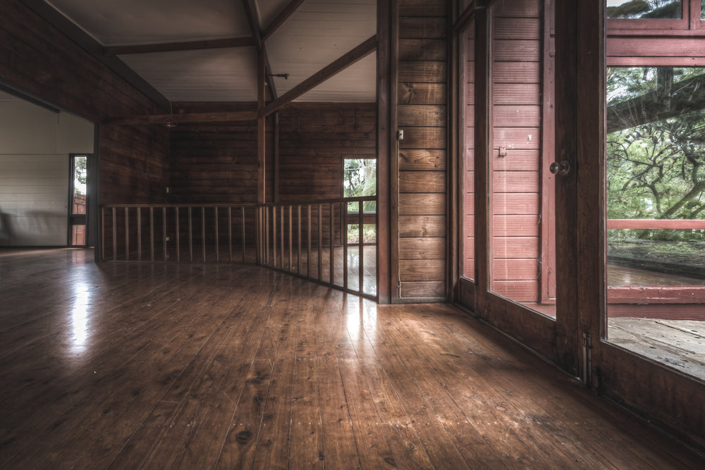 Entrance at Waratah Park, wide hardwood floorboards run the length of an empty hall.