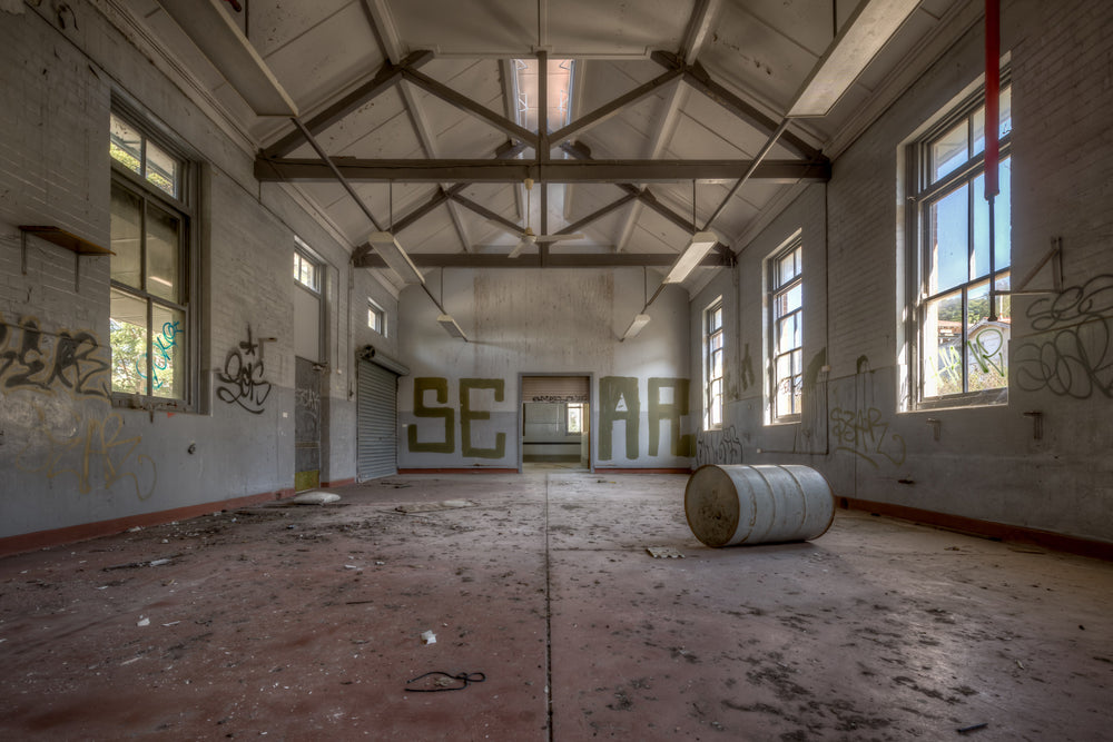 Arches at Waterfall Sanatorium, a large empty room in Waterfall Sanatorium.