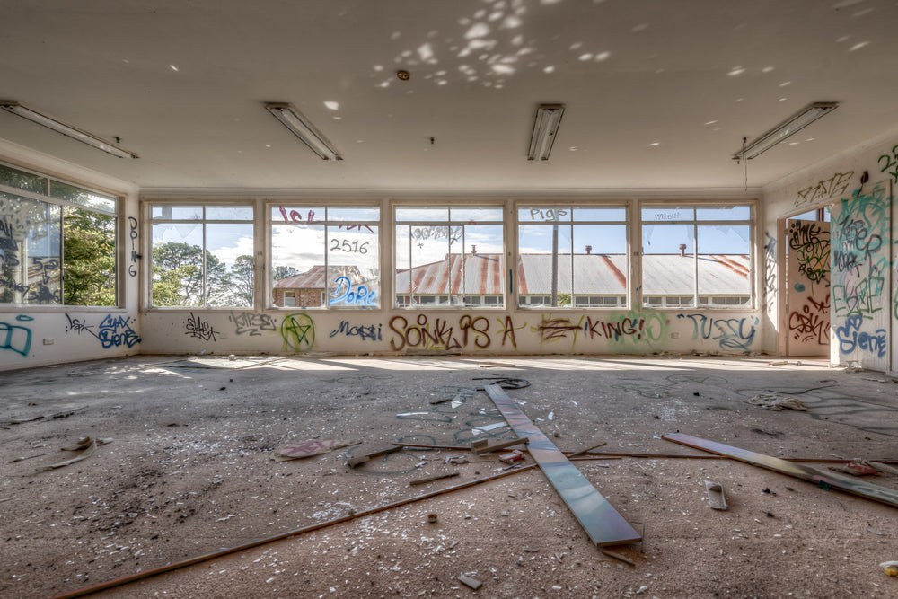 Daylight at Waterfall Sanatorium, a wide room stripped bare.