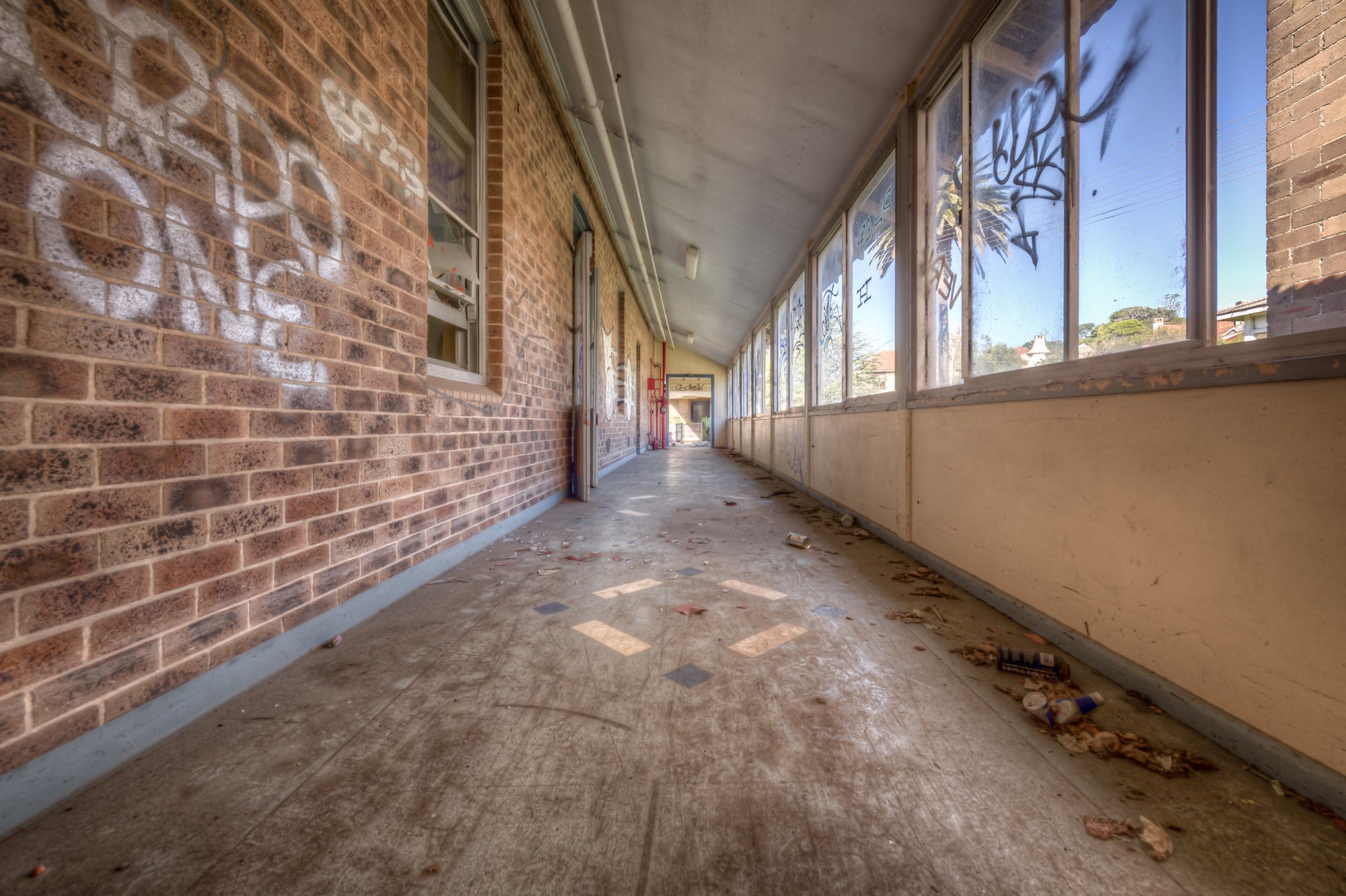 Fibro Annex at Waterfall Sanatorium, a covered walkway runs the length of a fibro and brick annex building.