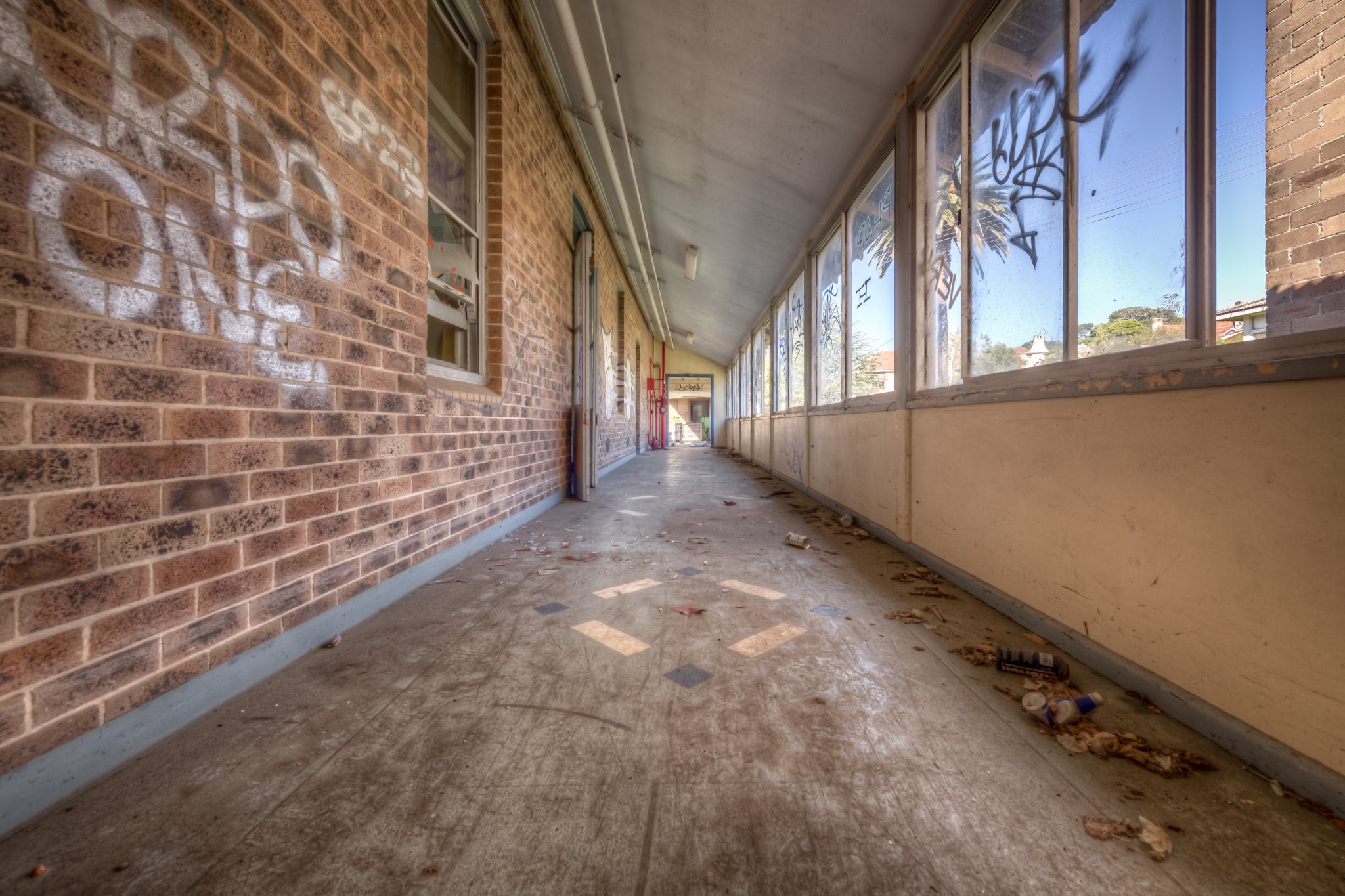 Fibro Annex at Waterfall Sanatorium, a covered walkway runs the length of a fibro and brick annex building.