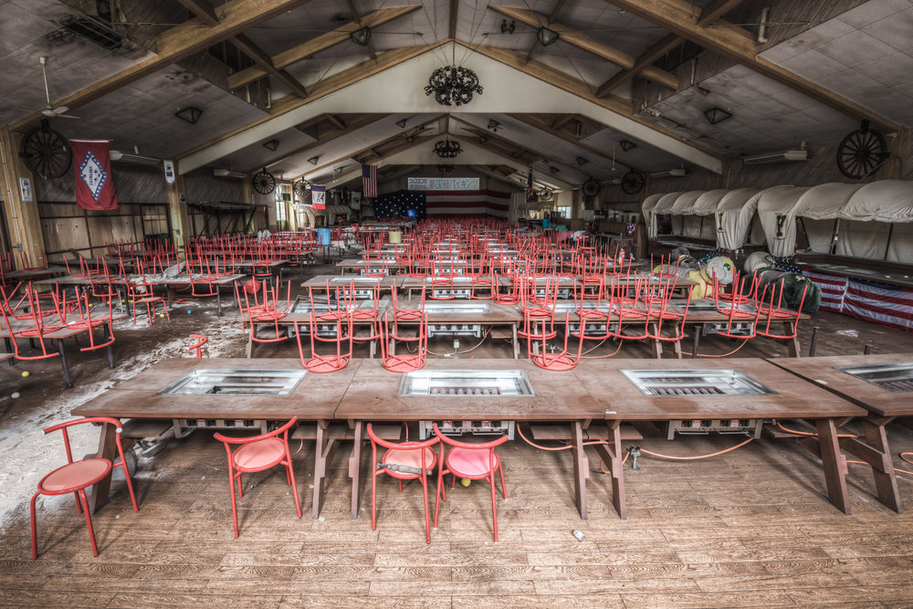 Dining Hall at Western Village, hundreds of chairs still stacked on tables for cleaning like they were when the theme park.
