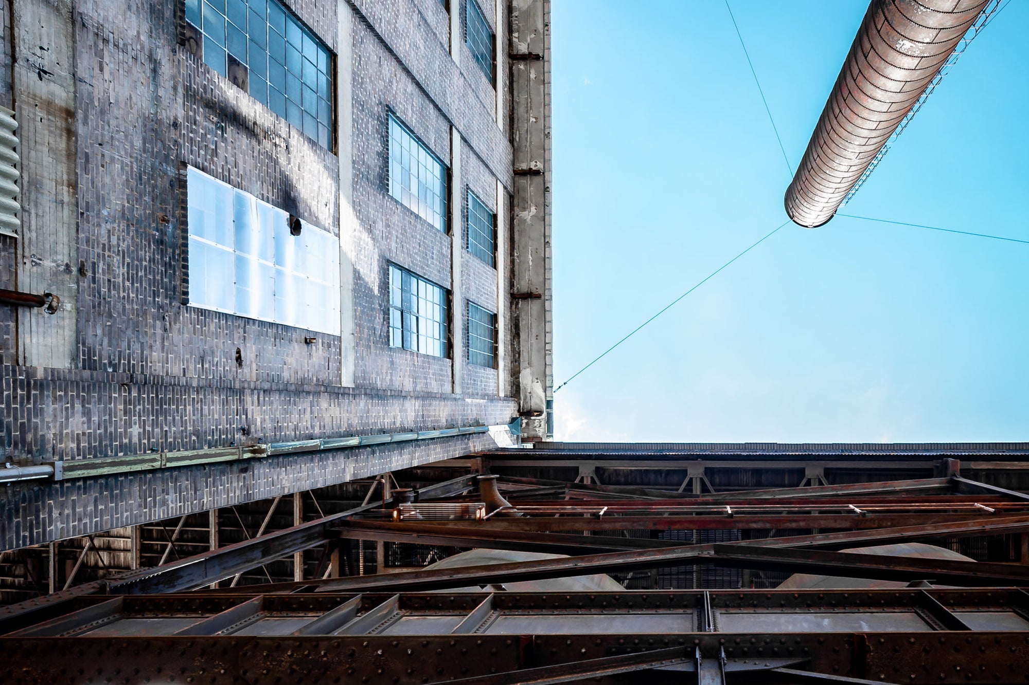 Boiler House Chimney And Ash Plant at White Bay Power Station, this perspective captures the meeting point of the Ash.