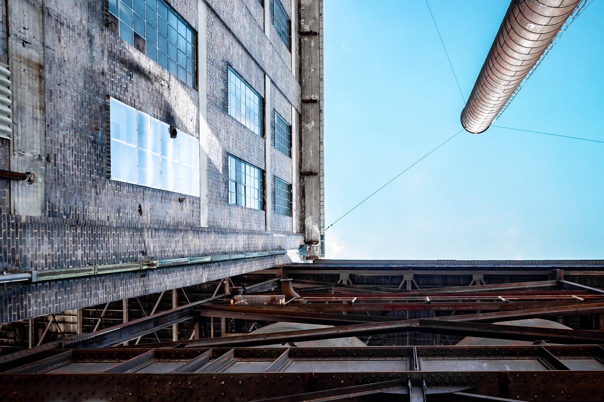 Boiler House Chimney And Ash Plant at White Bay Power Station, this perspective captures the meeting point of the Ash.