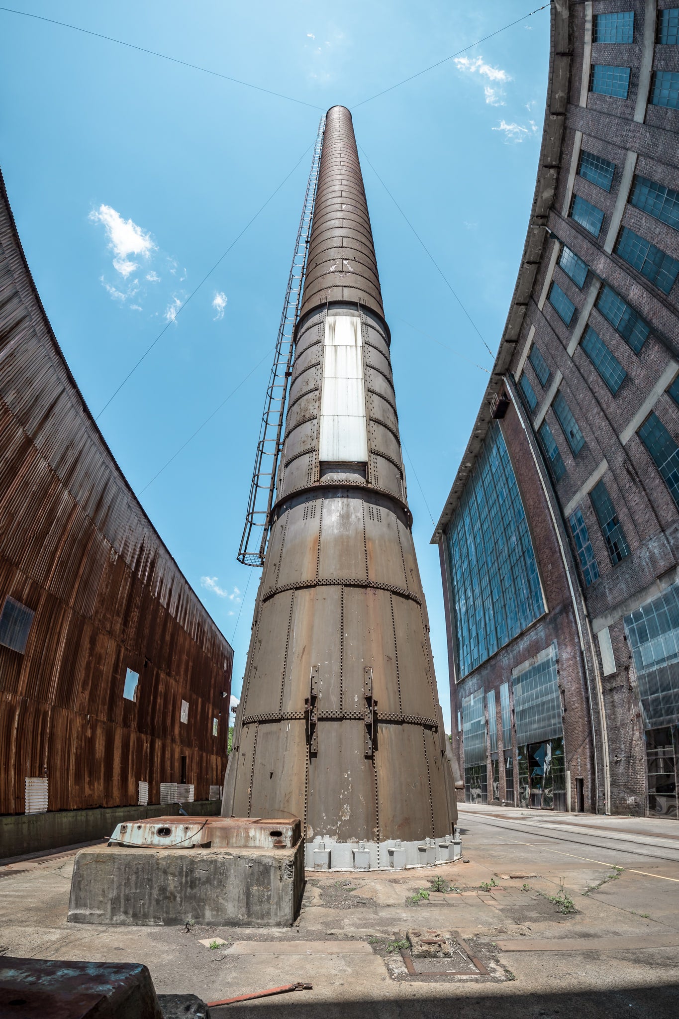 Chimney at White Bay Power Station, riveted steel panels rise skyward, forming the towering chimney of White Bay Power.