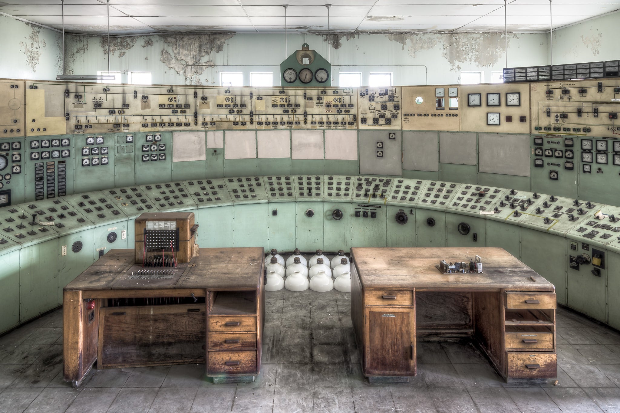 Control Room Desks at White Bay Power Station, a curved control panel wraps the room in a wide arc.