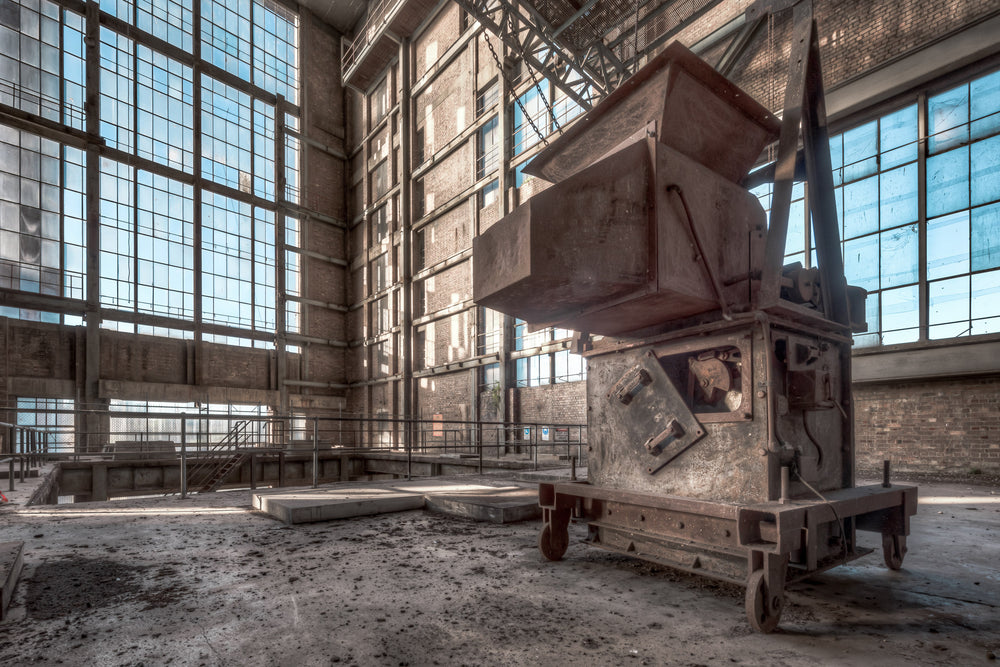 Mystery Machine at White Bay Power Station, a heavy steel skip sits on iron wheels in the centre of the turbine hall floor.