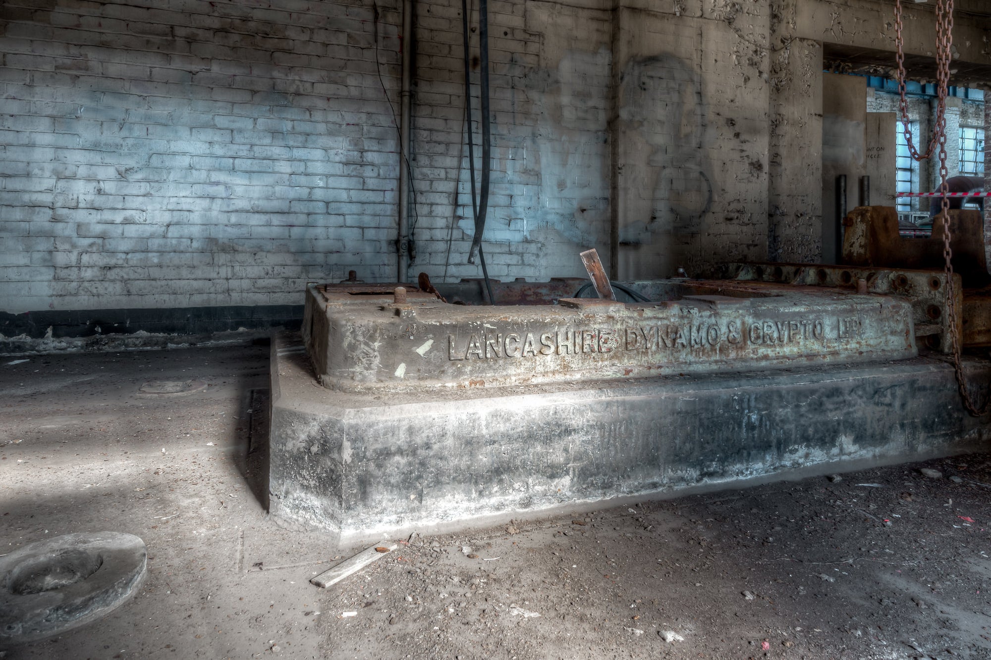 Plinth at White Bay Power Station, a heavy cast iron plinth sits on a stepped concrete base inside the pump house at White.