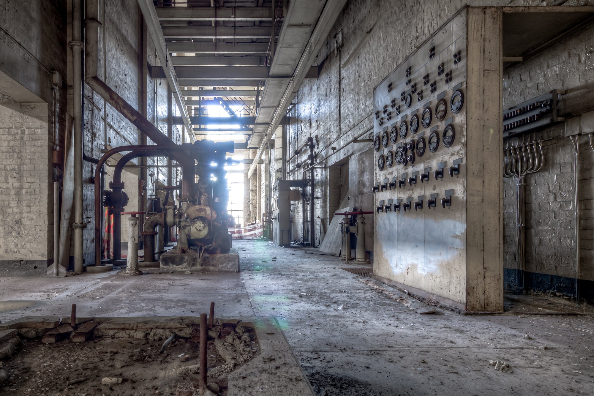 Pump House at White Bay Power Station, a long corridor runs between painted brick walls inside White Bay Power Station's.
