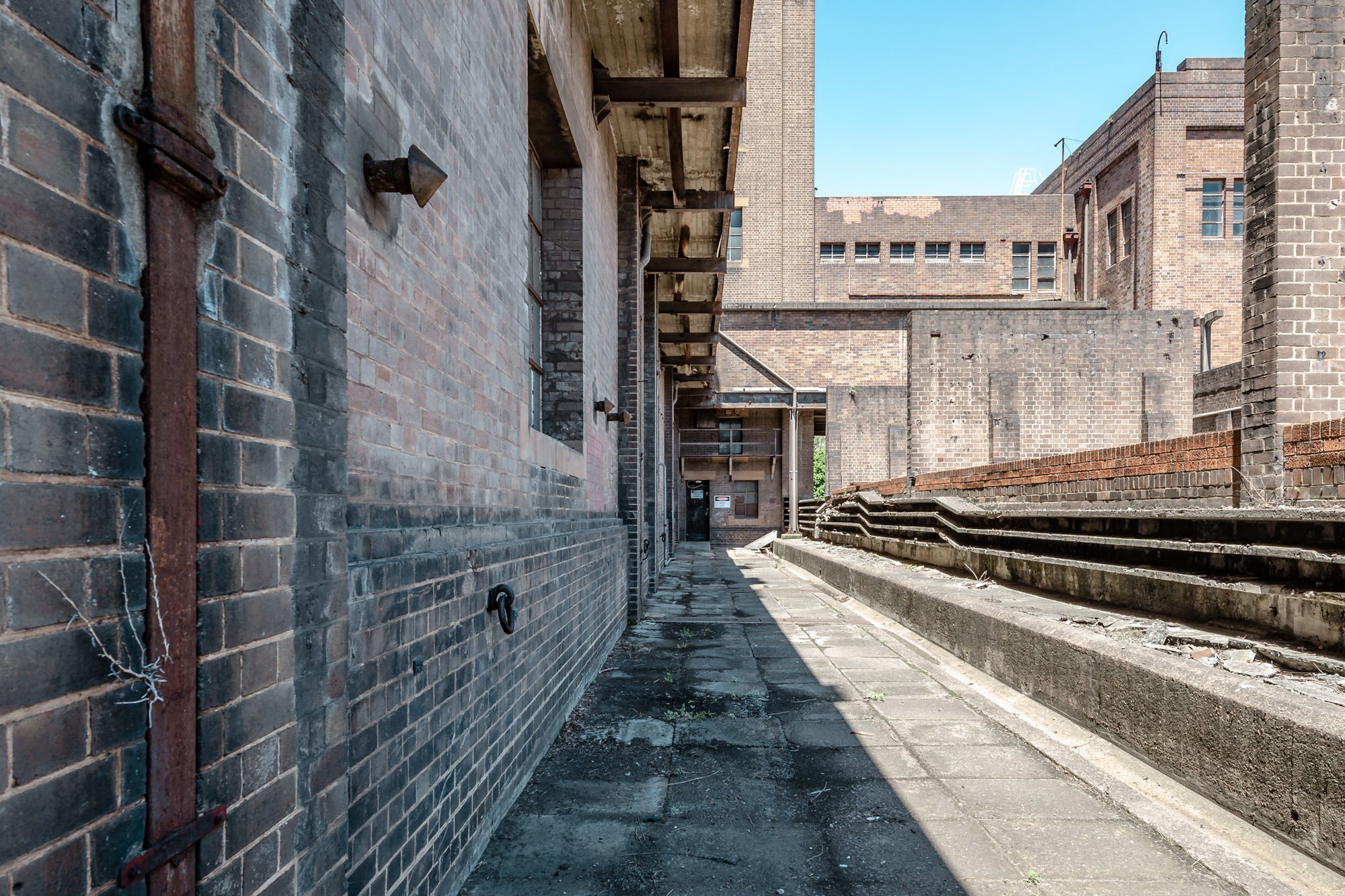 Switch House Wall at White Bay Power Station, a narrow walkway runs alongside the White Bay Power Station Switch House.