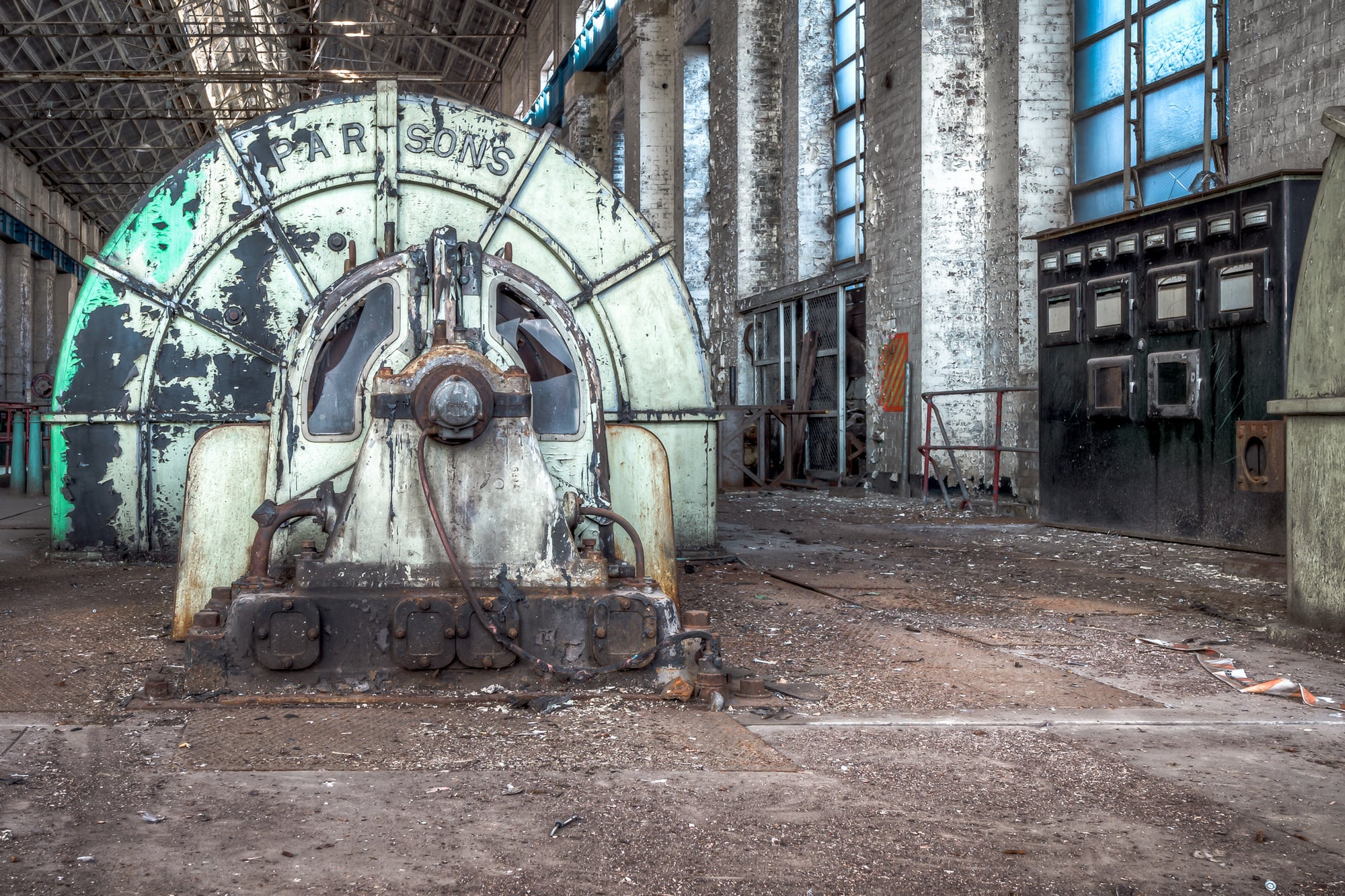 Turbine Governor at White Bay Power Station, a Parsons steam turbine dominates the floor of the turbine hall.