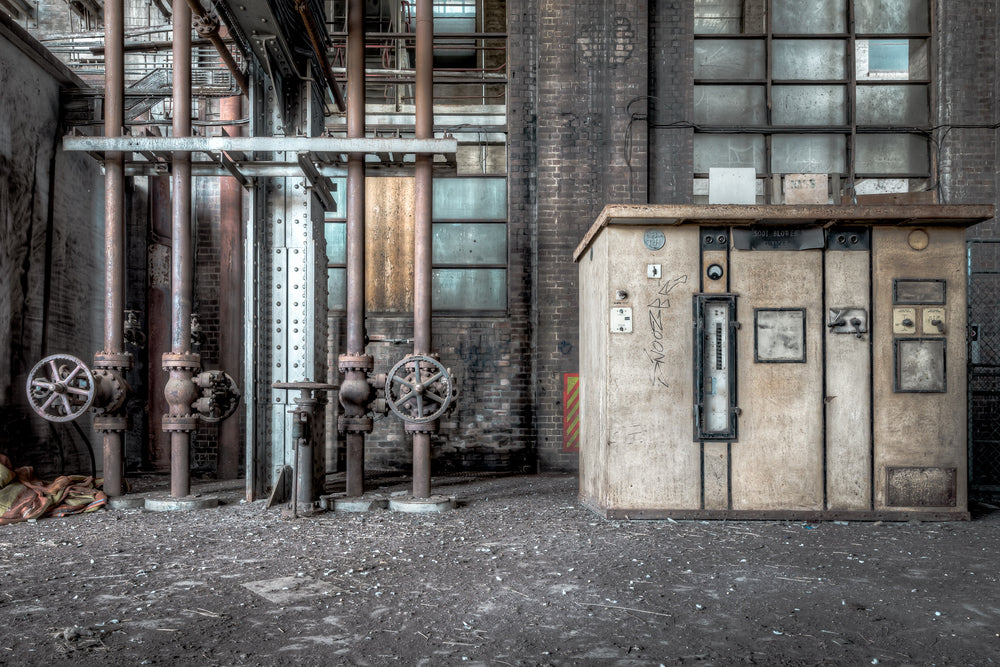 Turbine Hall Equipment at White Bay Power Station, a soot blower control panel sits against the brick wall of White Bay's.