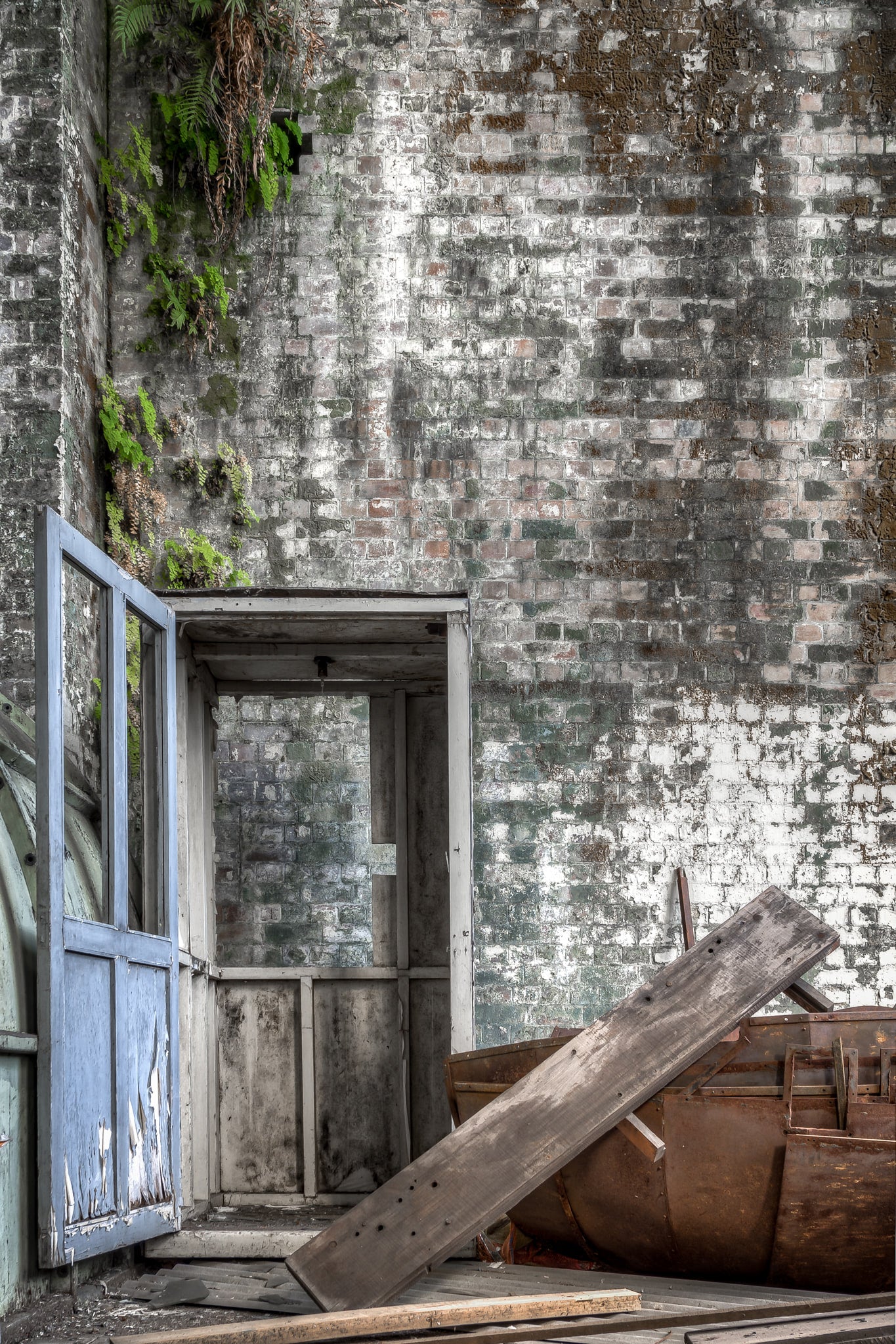 Turbine Hall Refuse at White Bay Power Station, a weathered timber man box stands open at White Bay Power Station.
