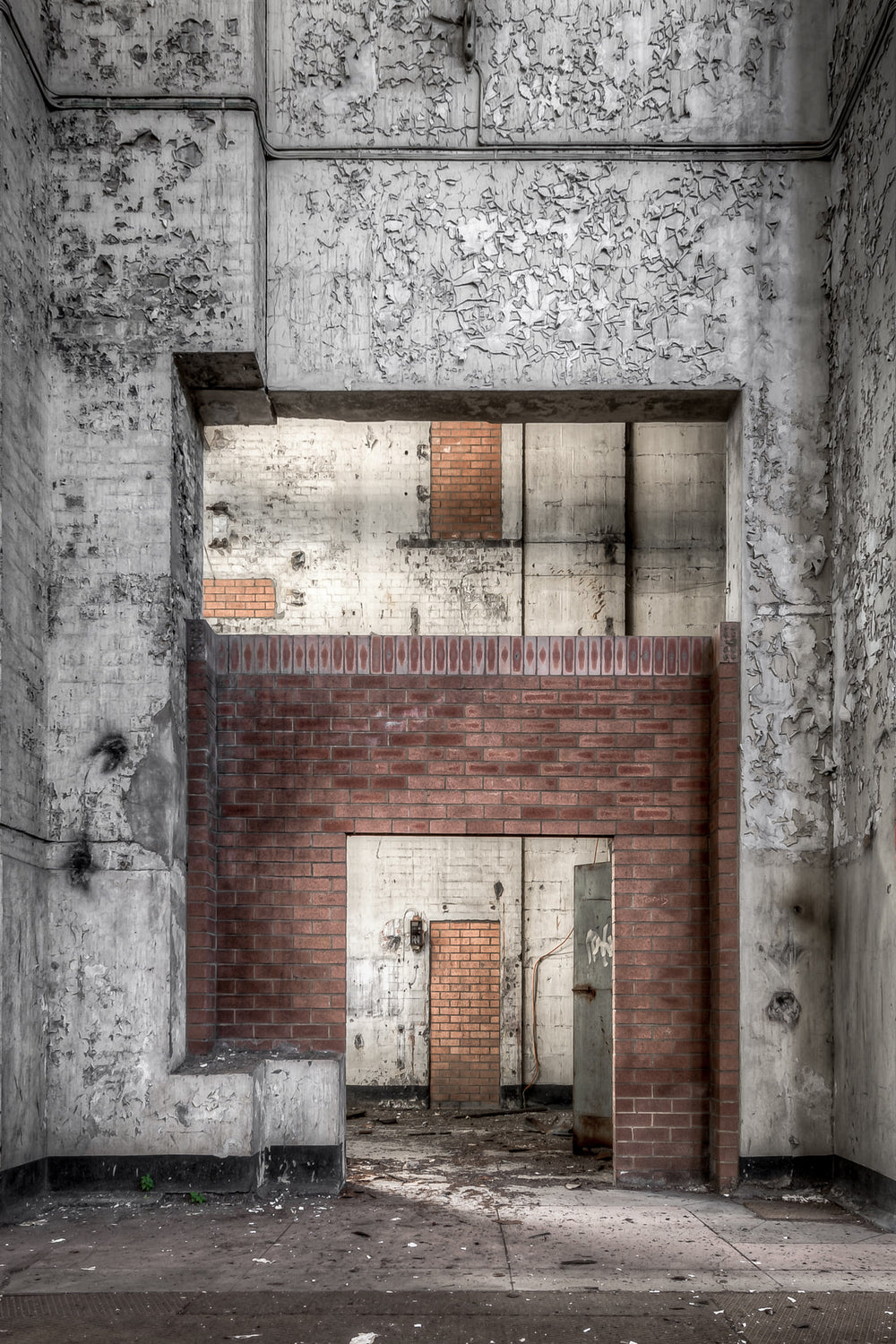 Workshop Entrance at White Bay Power Station, a red brick partition sits inside a massive concrete void, its neat.