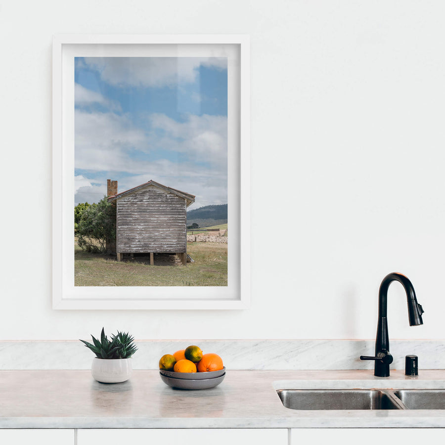 Delegate Shearers Rear at A Place to Call Home, a weatherboard cottage sits raised on timber stumps in dry pastoral land.
