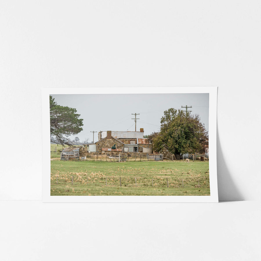 Numbla Vale Cottage at A Place to Call Home, a stone cottage sits low in open pastoral country near Numbla Vale, south-east.